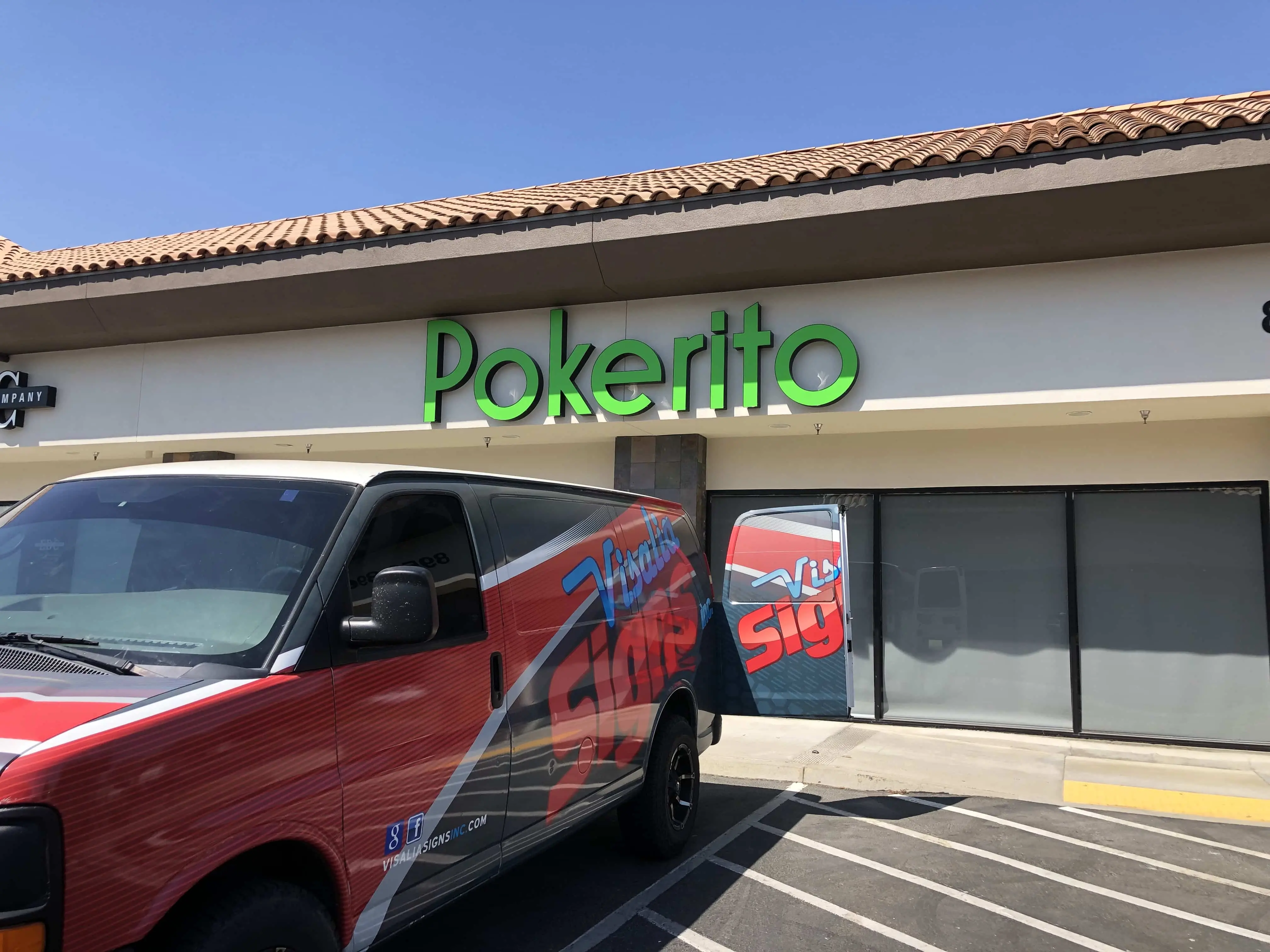 Sign installation in action – Visalia Signs Inc.