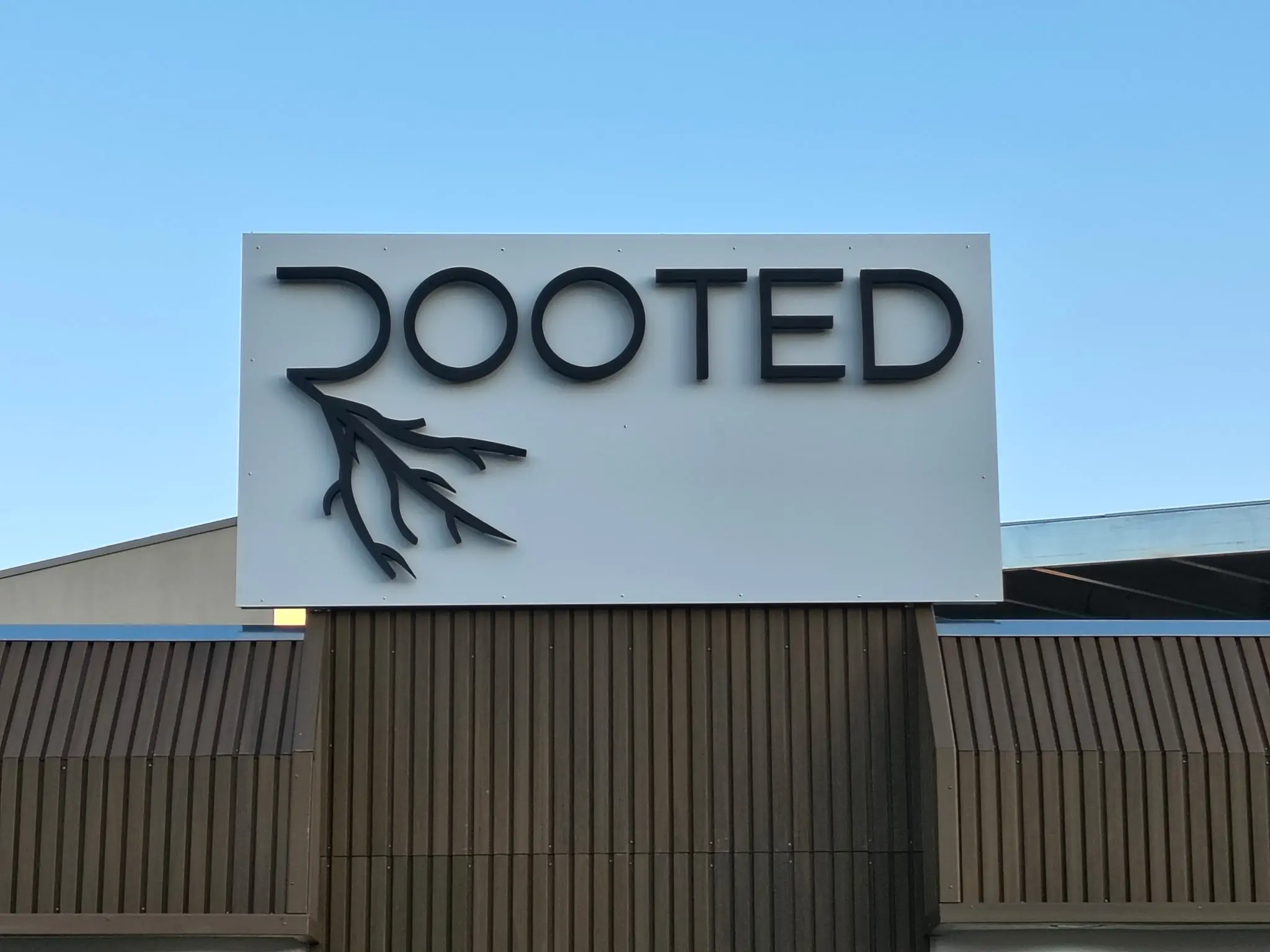 Custom sign Visalia CA – Rooted